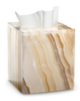Marble-patterned tissue box with white tissues on a white background